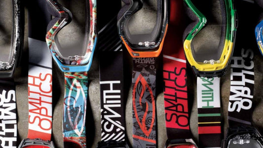 Smith mountain bike goggles laid out to show the designs on the goggle straps. 