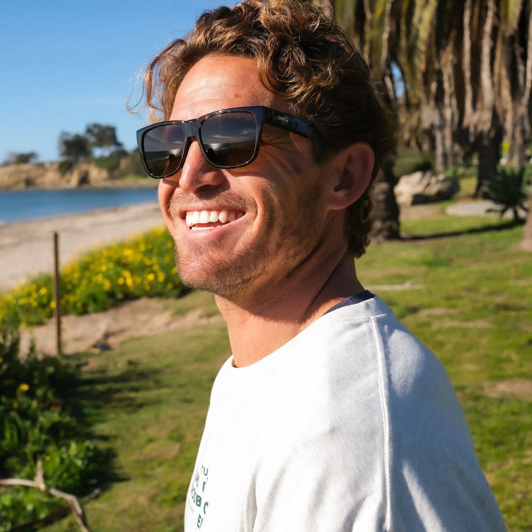 Surfer wearing Smith Lowdown Rx Sunglasses Surfer wearing Smith Lowdown Rx Sunglasses