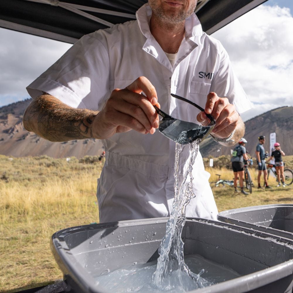 Man washing sunglasses Man washing sunglasses