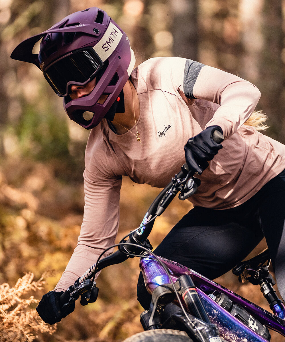 Woman riding mountain bike Woman riding mountain bike