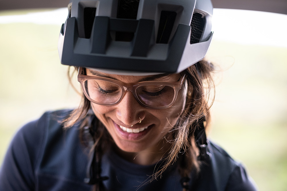 Woman with Smith prescription glasses and a Smith bike helmet