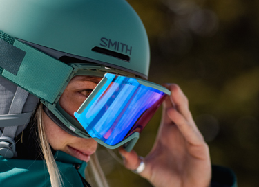 Woman using Smith MAG goggle technology