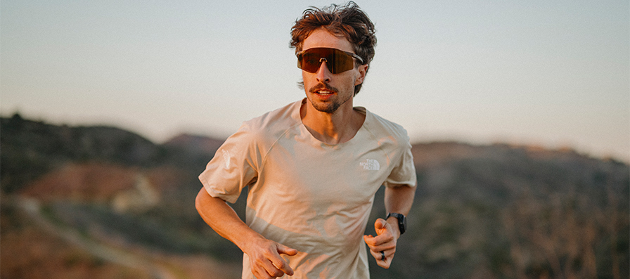 Runner wearing Smith Shift Split MAG photochromic sunglasses